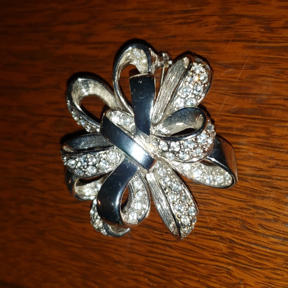 Roman Brand silvertone and rhinestone brooch